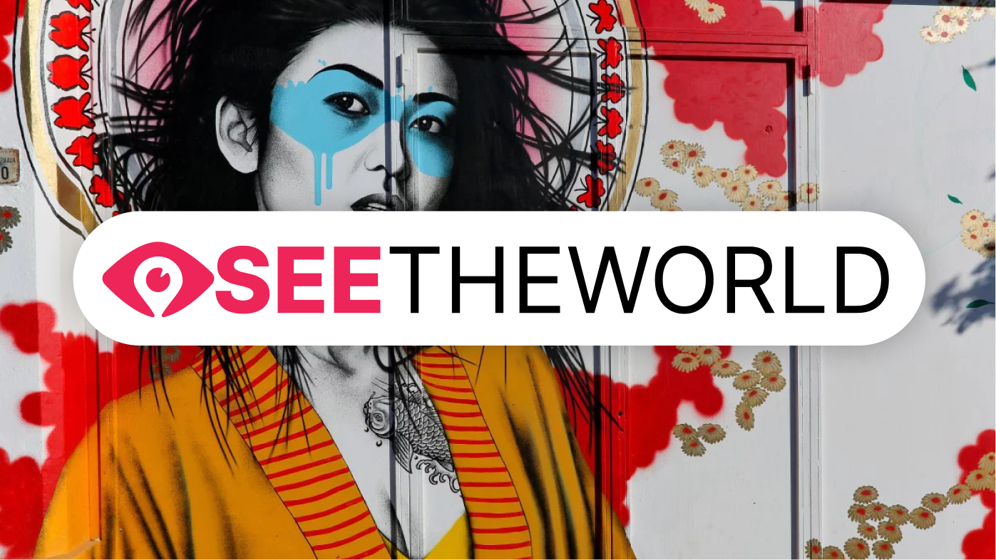 See the World's logo with a tropical island in the background